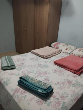 Quarto privativo em apartamento compartilhado